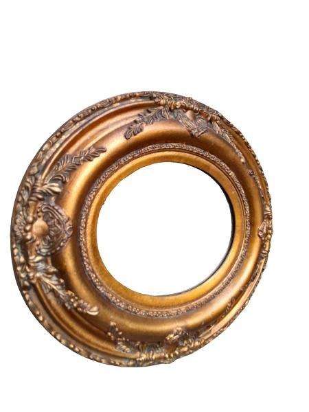 A French Style Carved Oval Giltwood Mirror