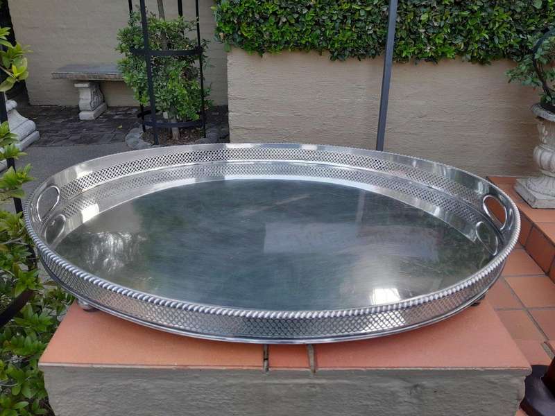 An Early 20th Century Silver-Plate Gallery Tray On Bun Feet