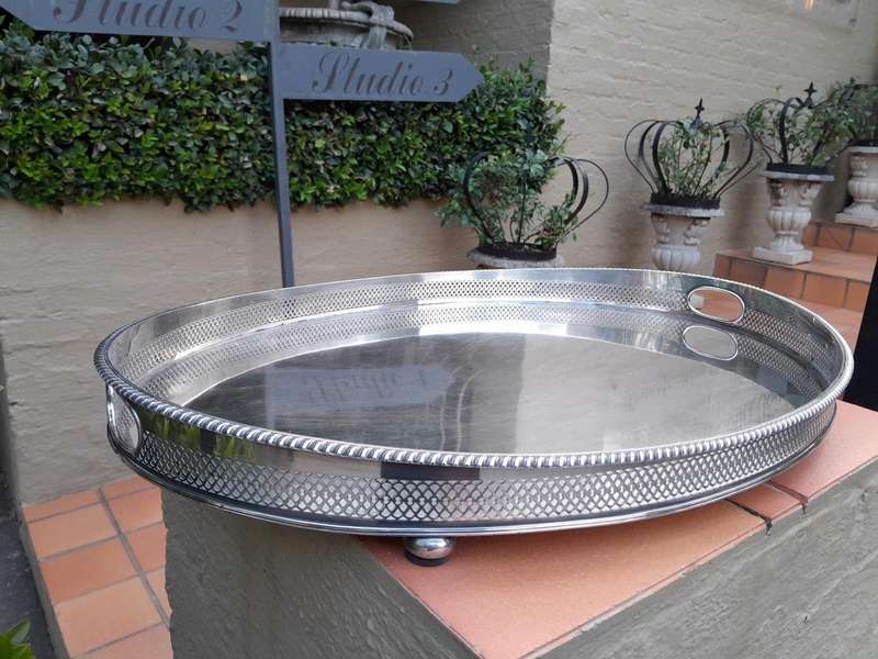 An Early 20th Century Silver-Plate Gallery Tray On Bun Feet