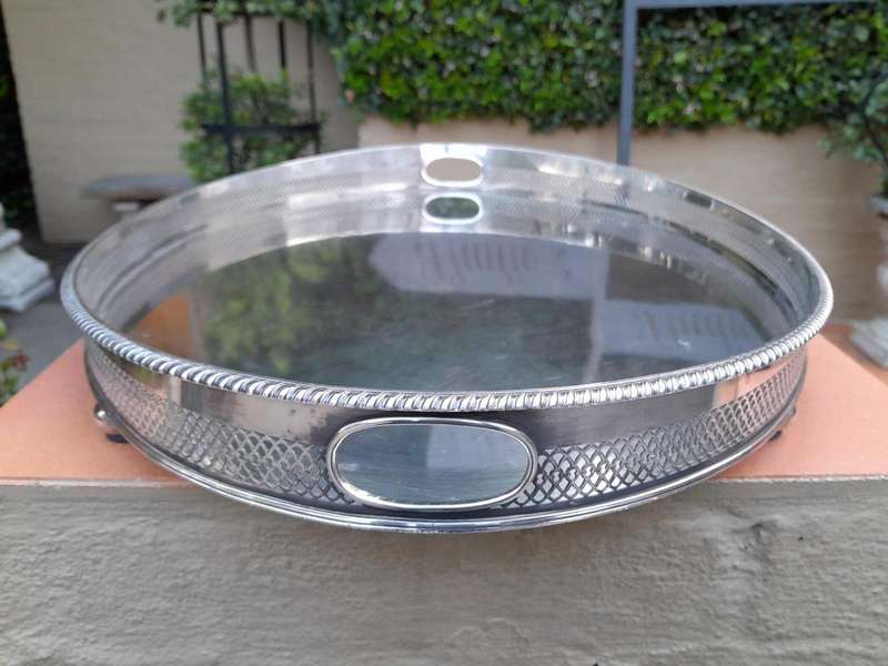 An Early 20th Century Silver-Plate Gallery Tray On Bun Feet