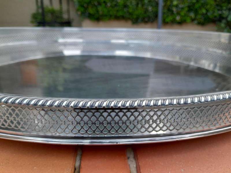 An Early 20th Century Silver-Plate Gallery Tray On Bun Feet
