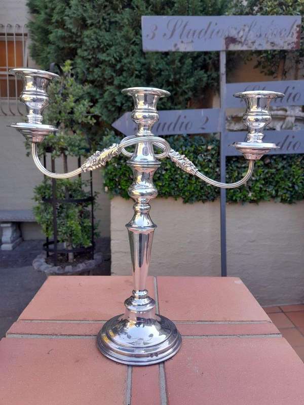 A Silver Plate Candelabra With Sconces Weighted
