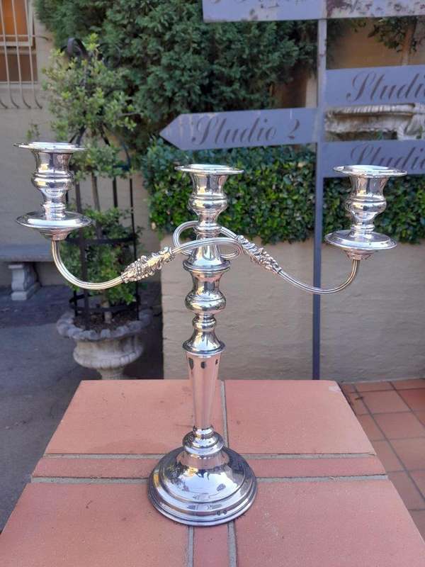 A Silver Plate Candelabra With Sconces Weighted