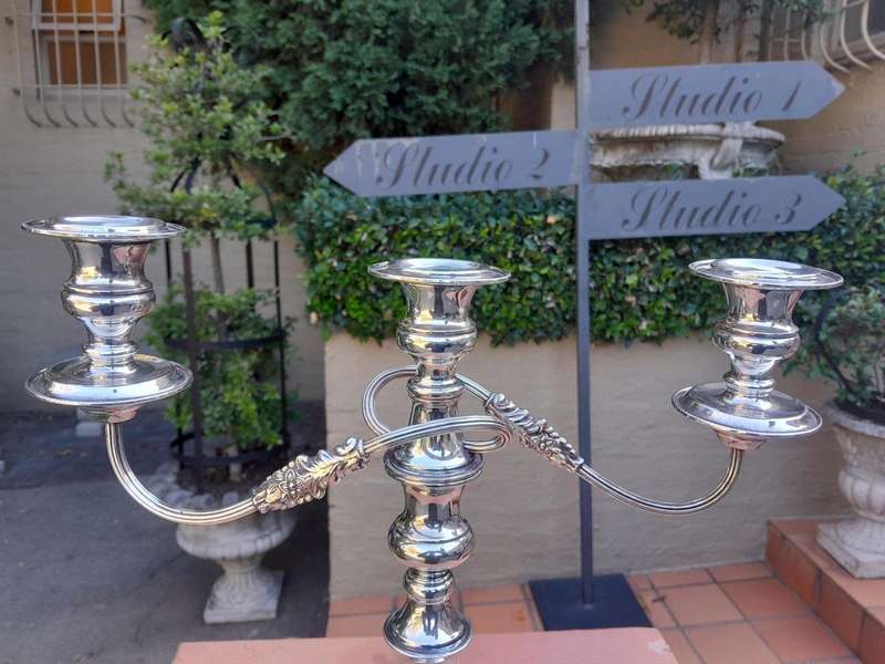 A Silver Plate Candelabra With Sconces Weighted