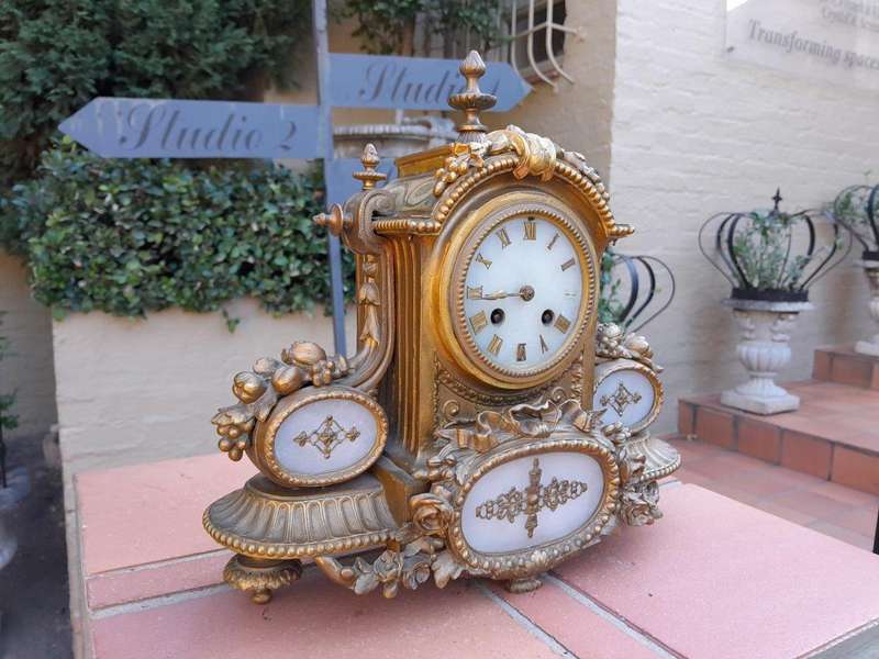 An Antique 19th Century French Gilt Metal Clock With Pendulum And Key In Working Condition
