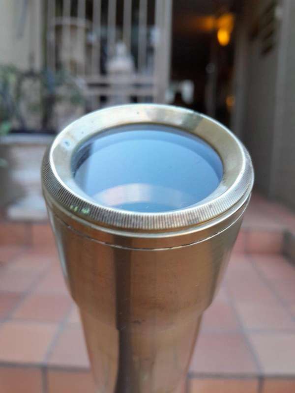 An Antique Brass Table Top Telescope On Tripod Base