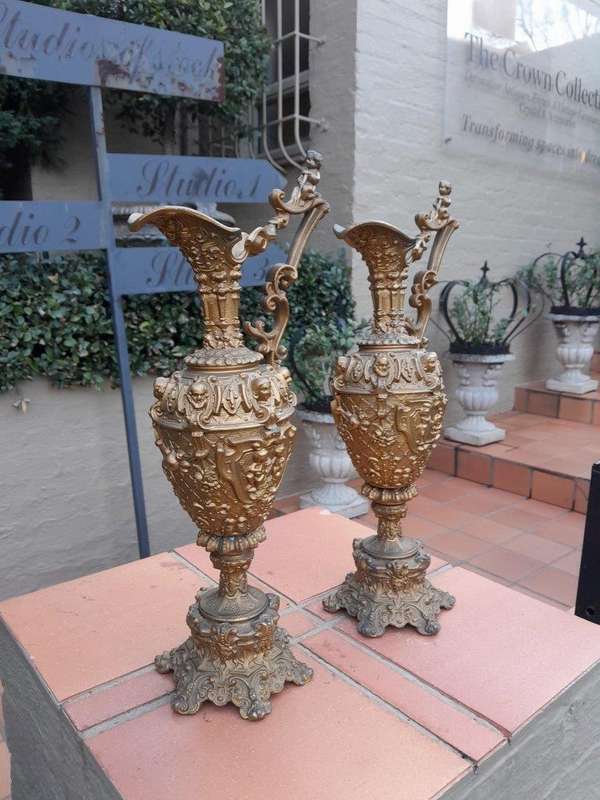An Antique 19th Century Pair Of Revival Style Gilt Metal Ewers Of Large Proportions