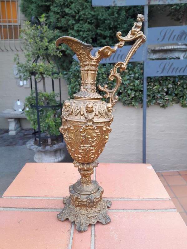 An Antique 19th Century Pair Of Revival Style Gilt Metal Ewers Of Large Proportions