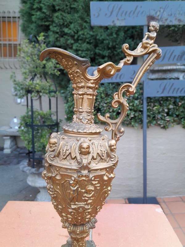 An Antique 19th Century Pair Of Revival Style Gilt Metal Ewers Of Large Proportions