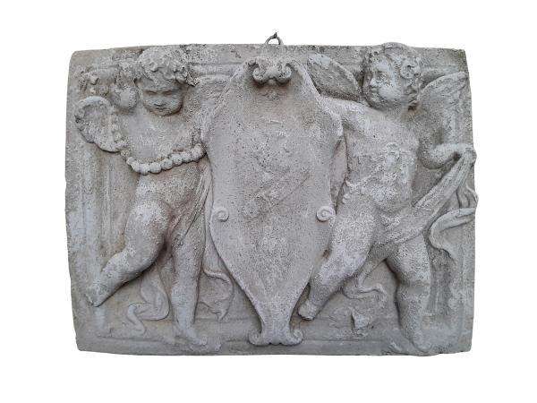 A Concrete Relief Plaque Sculpture With Putti (Cherubs) Holding A Crest