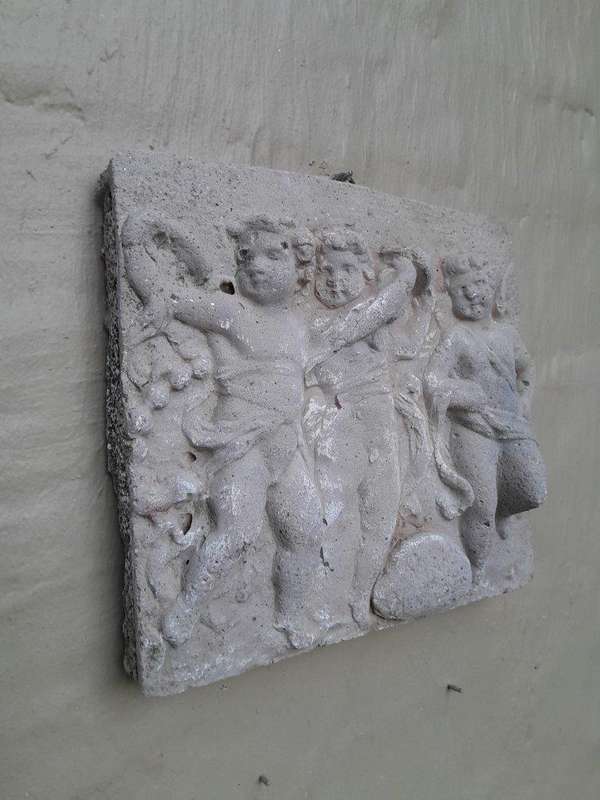 A Concrete Relief Plaque Sculpture With 3 Putti (Cherubs) In A Mythological Scene