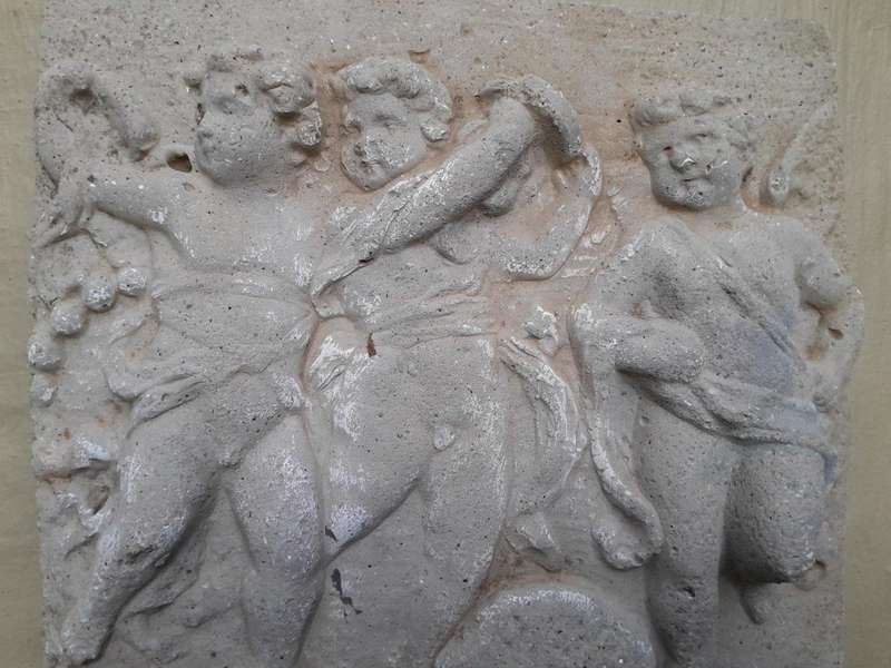 A Concrete Relief Plaque Sculpture With 3 Putti (Cherubs) In A Mythological Scene