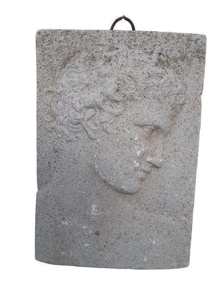 A Concrete Relief Plaque Sculpture With A Raised Bust Depiction