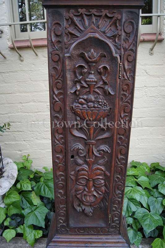 A Late 19th Century Oak Heavily Carved Ornate Longcase/Grandfather Clock