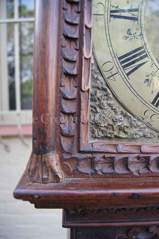 A Late 19th Century Oak Heavily Carved Ornate Longcase/Grandfather Clock