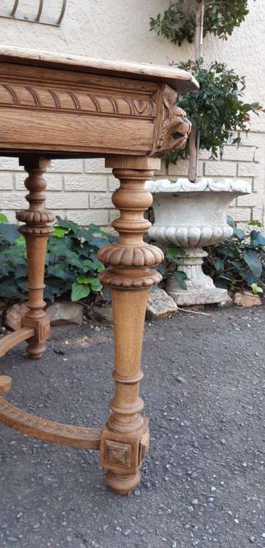 A Jacobean Bleached / Natural Wood Finish Oak Table With Ornate Carvings (4 Seater)