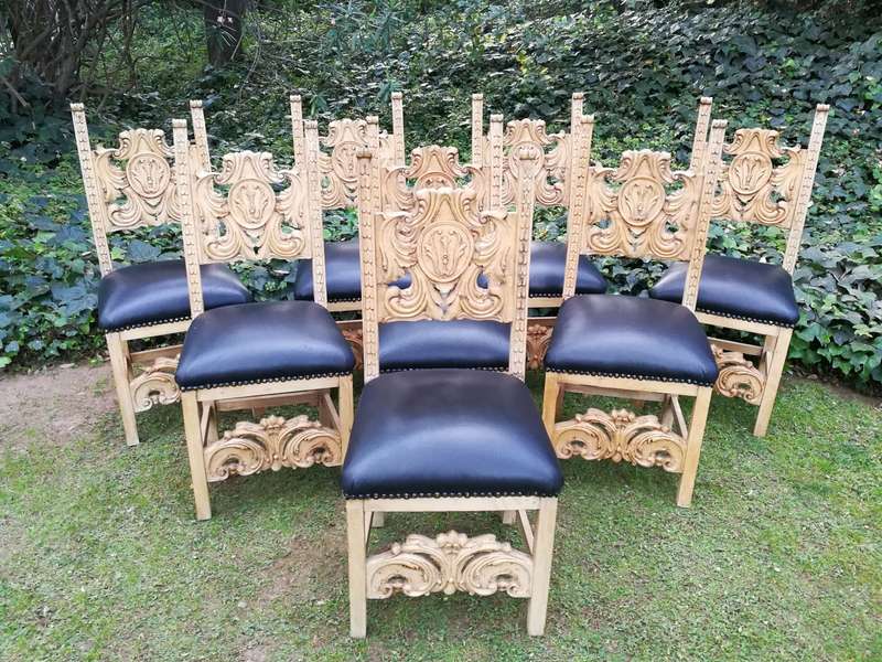 A 20th Century Set of Eight Carved and Bleached Oak Dining Chairs Upholstered in Leather