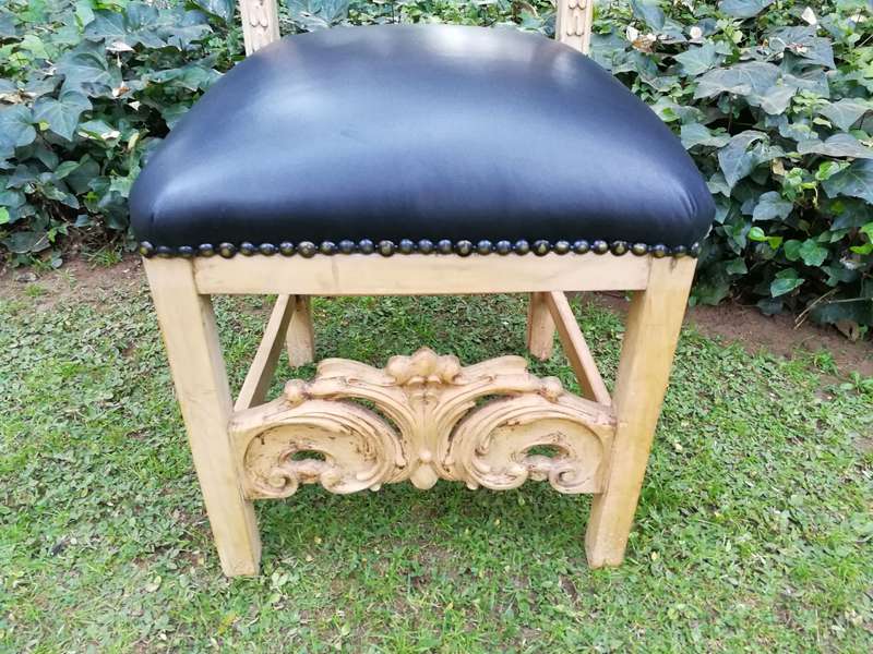 A 20th Century Set of Eight Carved and Bleached Oak Dining Chairs Upholstered in Leather