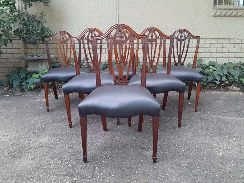 An 18th Century Circa 1790 Fine and Rare Set of Six George lll Hepplewhite Period Mahogany Shield...
