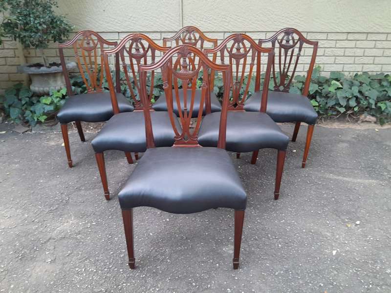 An 18th Century Circa 1790 Fine and Rare Set of Six George lll Hepplewhite Period Mahogany Shield...