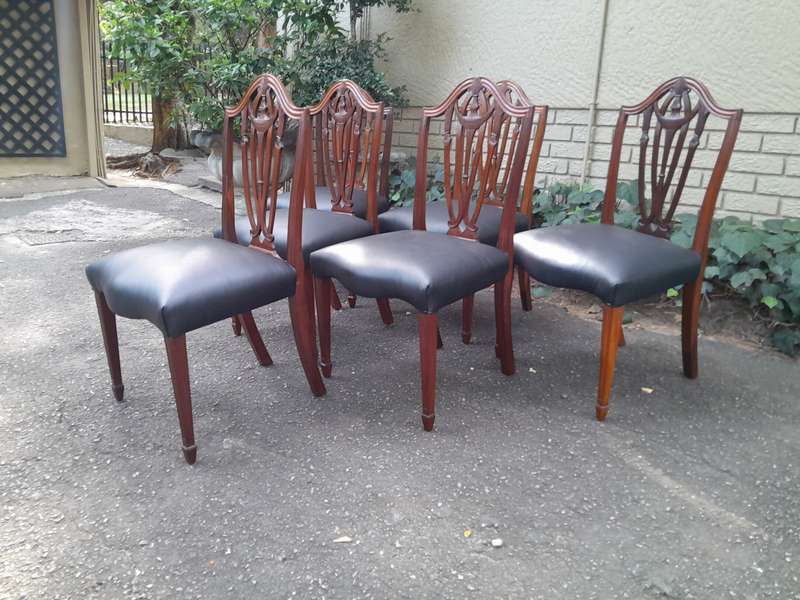 An 18th Century Circa 1790 Fine and Rare Set of Six George lll Hepplewhite Period Mahogany Shield...