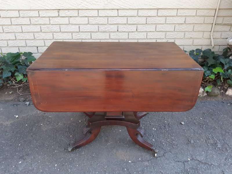 Regency Inlaid Mahogany Dropside Breakfast Table with Brass Capped Claw Feet on Castors