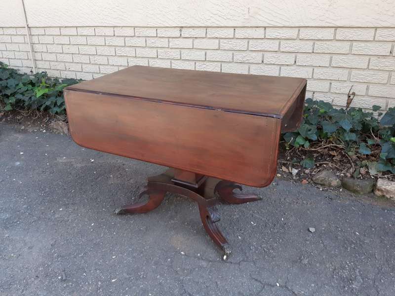 Regency Inlaid Mahogany Dropside Breakfast Table with Brass Capped Claw Feet on Castors
