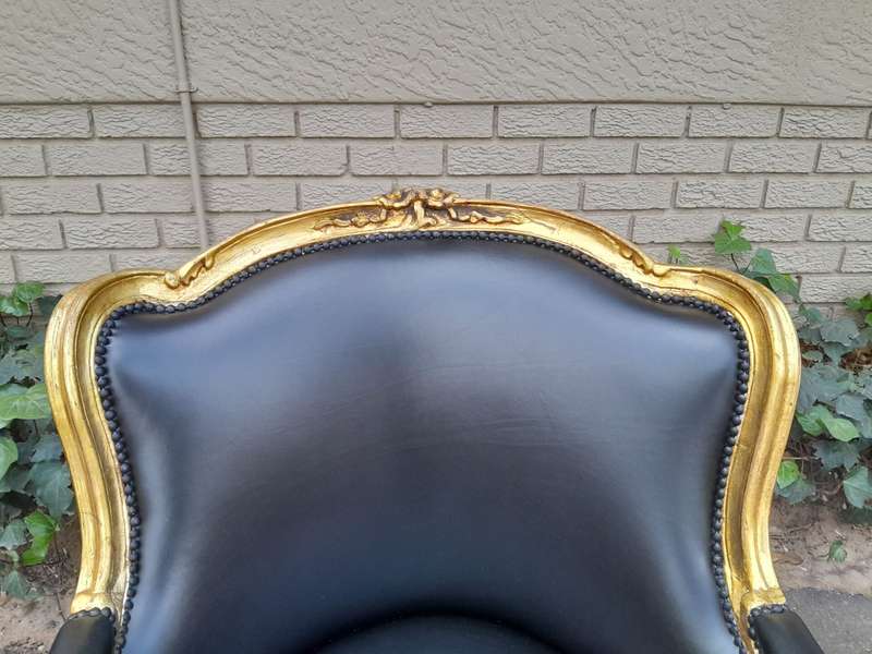 A 20th Century French Style Pair Of Carved Gilt Wood Armchairs