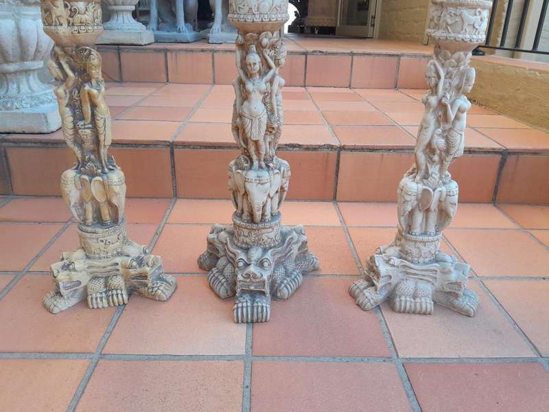 A Set of Three Columns / Candle Holders