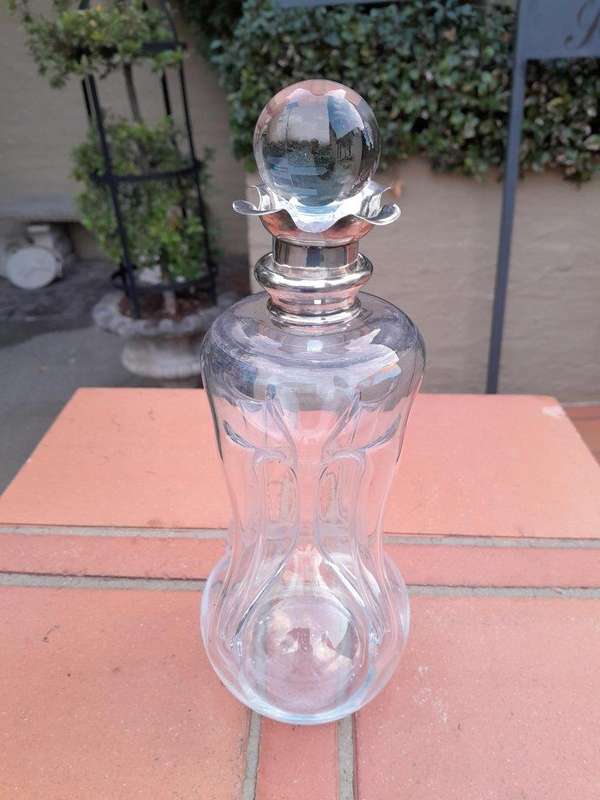 An Antique Victorian Circa 1890s  Glug-glug Decanter with Silver Collar