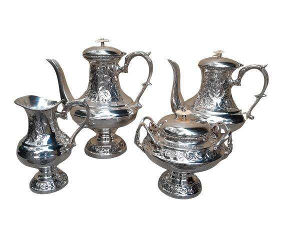A Crown Collection Sheffield Set of Four Pieces of Silver Plate Tea Service