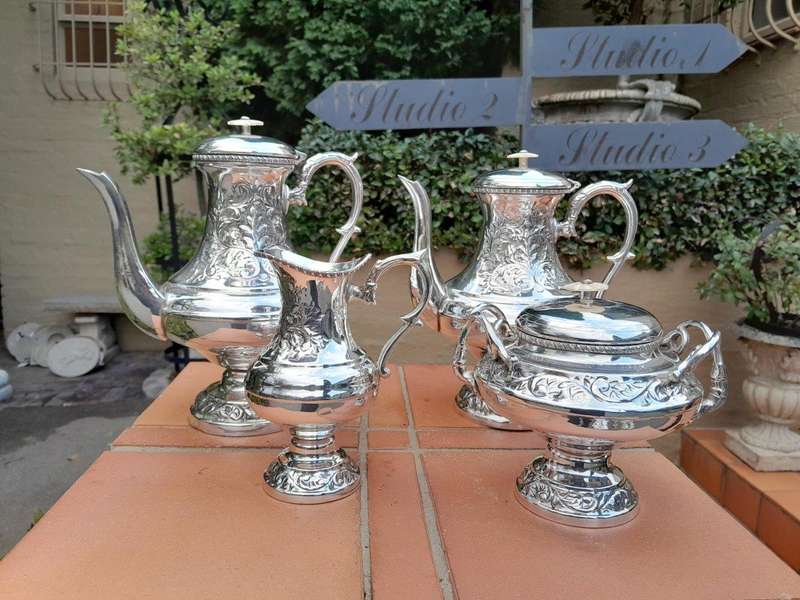 A Crown Collection Sheffield Set of Four Pieces of Silver Plate Tea Service
