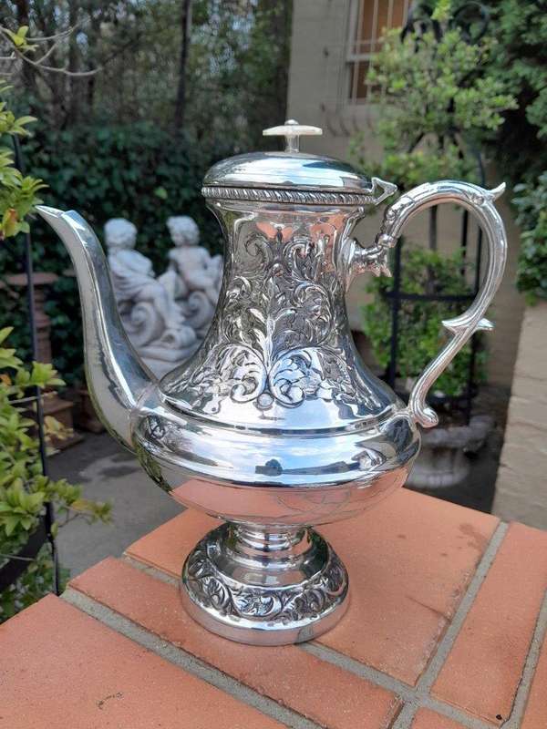 A Crown Collection Sheffield Set of Four Pieces of Silver Plate Tea Service