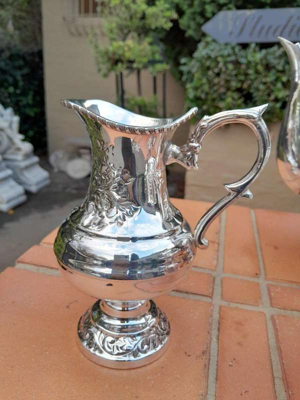 A Crown Collection Sheffield Set of Four Pieces of Silver Plate Tea Service