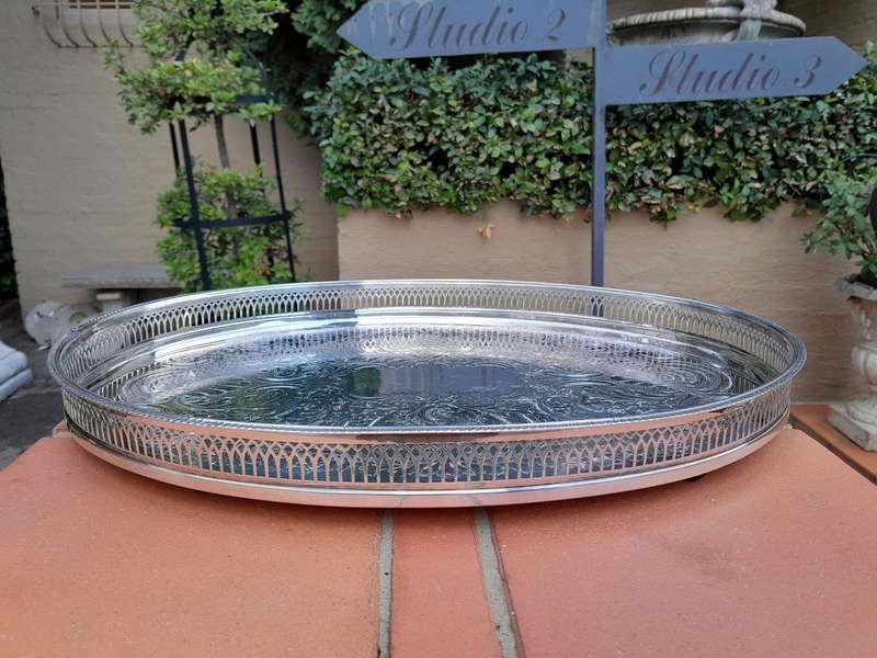 A 20th Century Silver-plated Gallery Tray on Four Bun Feet