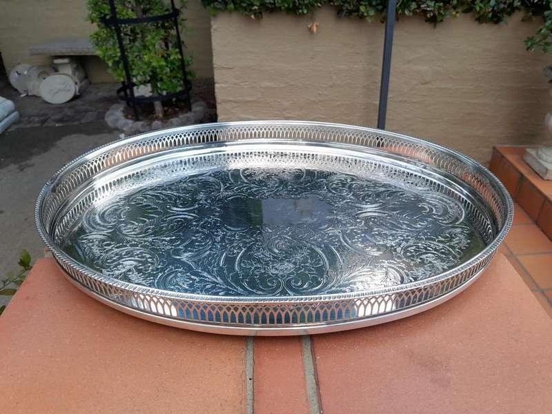 A 20th Century Silver-plated Gallery Tray on Four Bun Feet