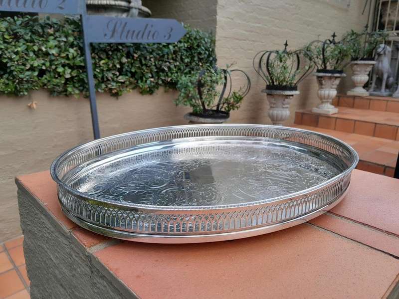A 20th Century Silver-plated Gallery Tray on Four Bun Feet