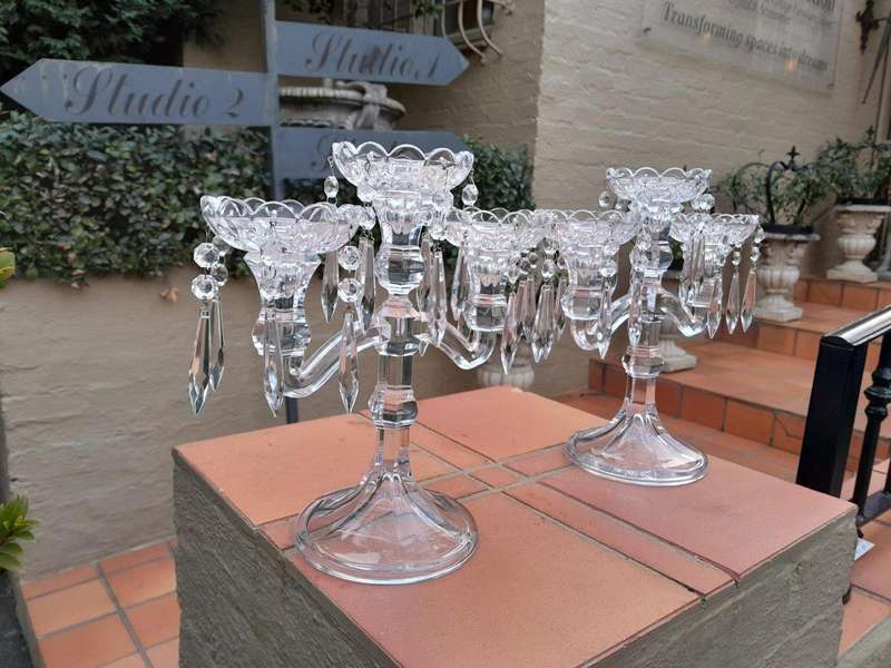A 20TH Century Pair of Candelabras with Drip Tray and Crystals