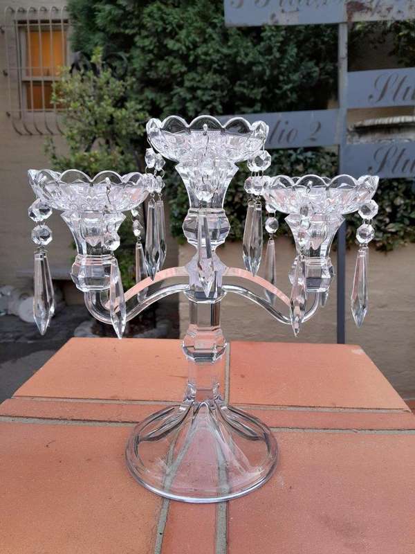 A 20TH Century Pair of Candelabras with Drip Tray and Crystals