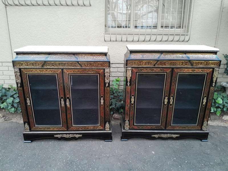 A Near Pair of Late 19th Century  / Early 20th century French Boulle Ebonised and Gilt Metal Cabi...