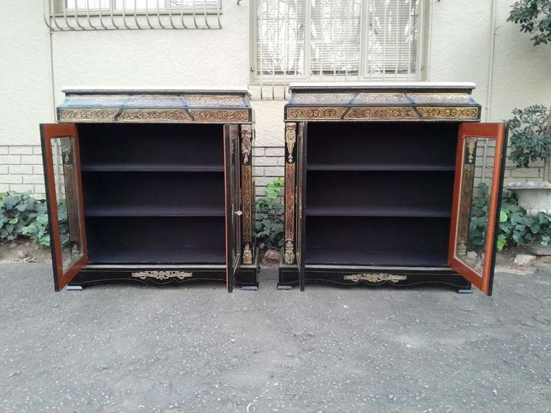 A Near Pair of Late 19th Century  / Early 20th century French Boulle Ebonised and Gilt Metal Cabi...
