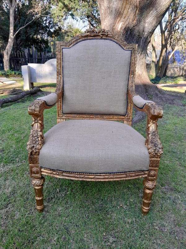 An Antique 19th Century French Pair of  Louis XV Style Heavily Carved Giltwood Armchairs