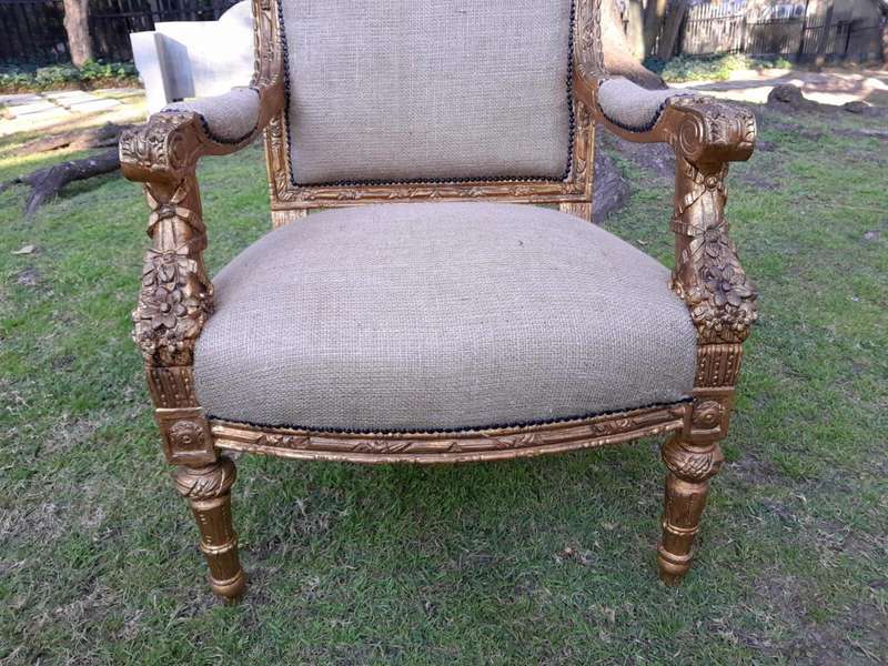 An Antique 19th Century French Pair of  Louis XV Style Heavily Carved Giltwood Armchairs