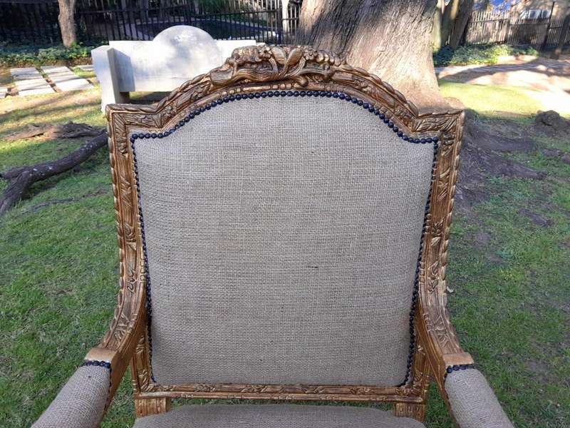 An Antique 19th Century French Pair of  Louis XV Style Heavily Carved Giltwood Armchairs