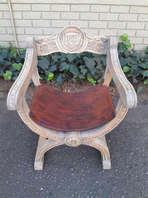 An Antique Early 20th Century Savonarola Carved Oak Chair with Leather Seat in a Contemporary Ble...