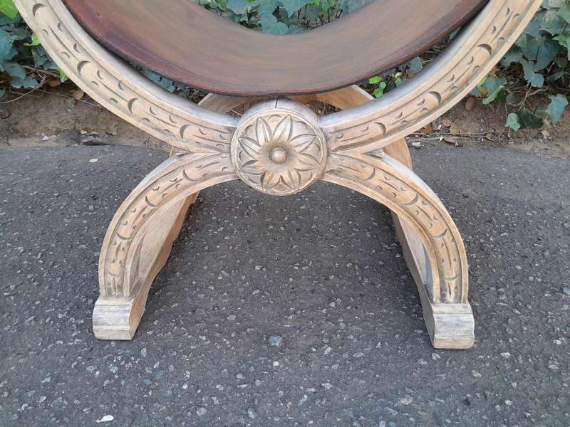 An Antique Early 20th Century Savonarola Carved Oak Chair with Leather Seat in a Contemporary Ble...