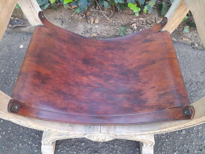 An Antique Early 20th Century Savonarola Carved Oak Chair with Leather Seat in a Contemporary Ble...