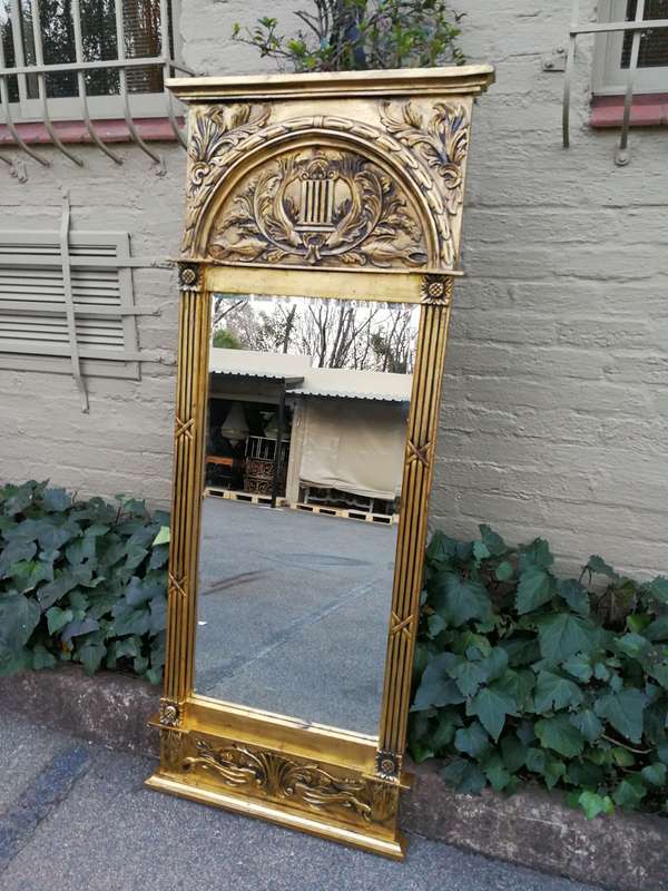 A 20th Century French Carved and Hand Gilded Bevelled Mirror