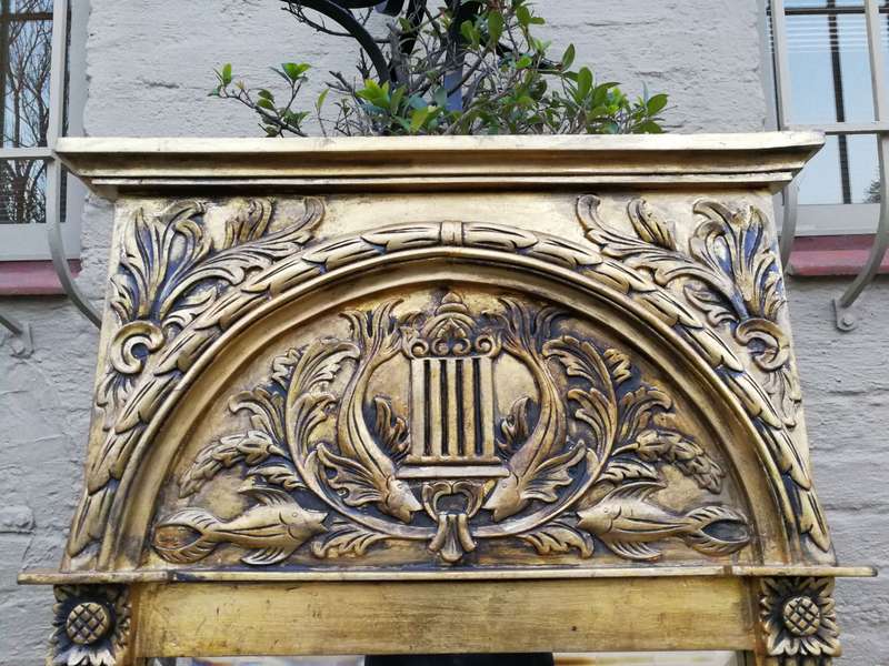 A 20th Century French Carved and Hand Gilded Bevelled Mirror