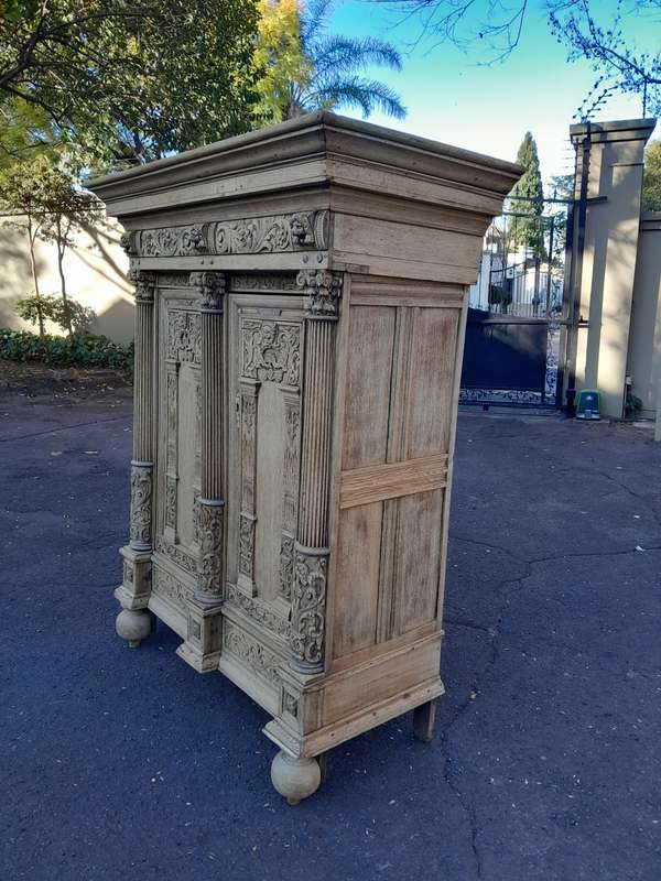 An 18th Century Renaissance Style Ornately Carved Cabinet/Armoire/ Kussenkast in a Contemporary B...